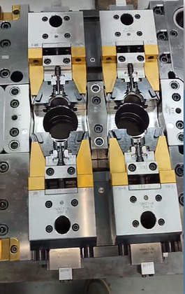 Mould detail with slides and cavity inserts